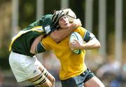 27 June 2004; Simon Hockings, Australia, is tackled by Andries Bekker, South Africa. IRB U21 World Championship 3rd/4th place play-off Australia v South Africa, Hughenden, Glasgow, Scotland. Picture credit; Brendan Moran / SPORTSFILE