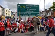 27 June 2004; Supporters from both teams gather in Thurles Square before the game. Guinness Munster Senior Hurling Championship Final, Cork v Waterford, Semple Stadium, Thurles, Co. Tipperary. Picture credit; Ray McManus / SPORTSFILE