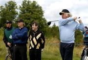 30 June 2004; John Magnier plays his tee shot watched by JP McManus and Dermot Desmond during the Smurfit European Open Pro-Am. South Course, K Club, Straffan, Co. Kildare, Ireland. Picture credit; Matt Browne / SPORTSFILE