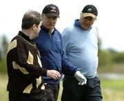 30 June 2004;  JP McManus chats with Dermot Desmond, centre, and John Magnier, right, during the Smurfit European Open Pro-Am. South Course, K Club, Straffan, Co. Kildare, Ireland. Picture credit; Matt Browne / SPORTSFILE