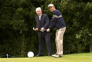 30 June 2004; Padraig Harrington with Gerry McQuaid, Commercial Director, 02 Ireland, after a press conference where it was announced that he is to carry the O2 Ireland brand logo on both sides of his playing headwear. The K Club, Straffan, Co. Kildare, Ireland. Picture credit; Matt Browne / SPORTSFILE