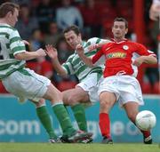2 July 2004; Alan Moore, Shelbourne, in action against Pat Deans, left, and Keith Doyle, Shamrock Rovers. eircom league, Premier Division, Shelbourne v Shamrock Rovers, Tolka Park, Dublin. Picture credit; David Maher / SPORTSFILE