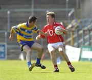 3 July 2004; Conor McCarthy, Cork, in action against Alan Clohessy, Clare. Bank of Ireland Football Championship Qualifier, Round 2, Clare v Cork, Cusack Park, Ennis, Co. Clare. Picture credit; Ray McManus / SPORTSFILE