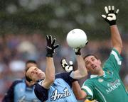 3 July 2004; Ian Roberston, Dublin, in action against Seamus Quinn, Leitrim. Bank of Ireland Football Championship Qualifier, Round 2, Leitrim v Dublin, O'Moore Park, Carrick-on-Shannon, Co. Leitrim. Picture credit; David Maher / SPORTSFILE