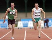 3 July 2004; Ireland's Gary Ryan (21) races to the finish to win the Men's 100m event ahead of Ireland's Paul Brizzel. 53rd Bupa Ireland Cork City Sports, Mardyke Arena, Cork.Picture credit; Brian Lawless / SPORTSFILE
