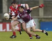 3 July 2004; Mathew Clancy, Galway, in action against Derek Shevlin, Louth. Bank of Ireland Football Championship Qualifier, Round 2, Galway v Louth, Parnell Park, Dublin. Picture credit; SPORTSFILE