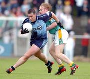 3 July 2004; Jonathan Magee, Dublin, in action against Noel Doonan, Leitrim. Bank of Ireland Football Championship Qualifier, Round 2, Leitrim v Dublin, O'Moore Park, Carrick-on-Shannon, Co. Leitrim. Picture credit; David Maher / SPORTSFILE