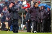 3 July 2004; Leitrim manager Declan Rowley, left, shouts instructions as Dublin manager Tommy Lyons walks by. Bank of Ireland Football Championship Qualifier, Round 2, Leitrim v Dublin, O'Moore Park, Carrick-on-Shannon, Co. Leitrim. Picture credit; David Maher / SPORTSFILE