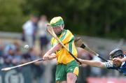 3 July 2004; Barry McGee, Donegal, in action against Patrick Mullaney,  Laois. All-Ireland U21 'B' Hurling Final, Laois v Donegal, O'Moore Park, Carrick-on-Shannon, Co. Leitrim. Picture credit; David Maher / SPORTSFILE