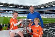 31 August 2013; Former Armagh star Steven McDonnell was the final GAA player to feature on the Bord Gáis Energy Legends Tour Series 2013 when he gave a unique tour of the Croke Park stadium and facilities this week. Steven is pictured here with Jack Lawlor, aged 9, left, and Jack Scallon, aged 8, both from Armagh City, Co. Armagh. For details of further Croke Park and museum events please check out www.crokepark.ie/events. Croke Park, Dublin. Picture credit: Matt Browne / SPORTSFILE