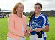 31 August 2013; Helen O'Rourke, Chief Executive Ladies Football Association presents Gráinne Smith, Cavan, with her player of the match trophy. TG4 All-Ireland Ladies Football Intermediate Championship, Semi-Final, Cavan v Down, Kingspan Breffni Park, Cavan. Photo by Sportsfile