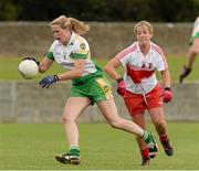 1 September 2013; Treasa McManus, Offaly, in action against Dania Donnelly, Derry. All-Ireland Ladies Football Junior Championship, Semi-Final, Offaly v Derry, Carrickmacross Emmets GAA Club, Emmet Park, Monaghan. Picture credit: Oliver McVeigh / SPORTSFILE