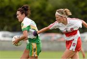 1 September 2013; Amy Kerrigan, Offaly, in action against Ashelene Groogan, Derry. All-Ireland Ladies Football Junior Championship, Semi-Final, Offaly v Derry, Carrickmacross Emmets GAA Club, Emmet Park, Monaghan. Picture credit: Oliver McVeigh / SPORTSFILE