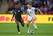 31 July 2023; Katie McCabe of Republic of Ireland in action against Uchenna Kanu of Nigeria during the FIFA Women's World Cup 2023 Group B match between Republic of Ireland and Nigeria at Brisbane Stadium in Brisbane, Australia. Photo by Stephen McCarthy/Sportsfile