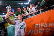 31 July 2023; Marissa Sheva of Republic of Ireland takes a selfie with supporters after the FIFA Women's World Cup 2023 Group B match between Republic of Ireland and Nigeria at Brisbane Stadium in Brisbane, Australia. Photo by Stephen McCarthy/Sportsfile