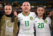 31 July 2023; Katie McCabe of Republic of Ireland with Áine O'Gorman, left, and Marissa Sheva after the FIFA Women's World Cup 2023 Group B match between Republic of Ireland and Nigeria at Brisbane Stadium in Brisbane, Australia. Photo by Stephen McCarthy/Sportsfile