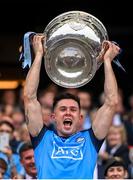 30 July 2023; David Byrne of Dublin lifts the Sam Maguire Cup after the GAA Football All-Ireland Senior Championship final match between Dublin and Kerry at Croke Park in Dublin. Photo by Ramsey Cardy/Sportsfile