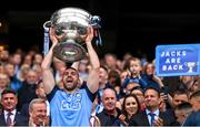 30 July 2023; Seán MacMahon of Dublin lifts the Sam Maguire Cup after the GAA Football All-Ireland Senior Championship final match between Dublin and Kerry at Croke Park in Dublin. Photo by Ramsey Cardy/Sportsfile