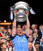 30 July 2023; Ciaran Kilkenny of Dublin lifts the Sam Maguire Cup after the GAA Football All-Ireland Senior Championship final match between Dublin and Kerry at Croke Park in Dublin. Photo by Ramsey Cardy/Sportsfile