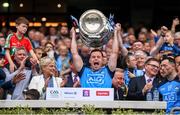 30 July 2023; Ross McGarry of Dublin lifts the Sam Maguire Cup after the GAA Football All-Ireland Senior Championship final match between Dublin and Kerry at Croke Park in Dublin. Photo by Ramsey Cardy/Sportsfile