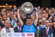 30 July 2023; Lorcan O'Dell of Dublin lifts the Sam Maguire Cup after the GAA Football All-Ireland Senior Championship final match between Dublin and Kerry at Croke Park in Dublin. Photo by Ramsey Cardy/Sportsfile