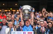 30 July 2023; Cian Murphy of Dublin lifts the Sam Maguire Cup after the GAA Football All-Ireland Senior Championship final match between Dublin and Kerry at Croke Park in Dublin. Photo by Ramsey Cardy/Sportsfile