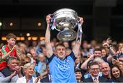 30 July 2023; Tom Lahiff of Dublin lifts the Sam Maguire Cup after the GAA Football All-Ireland Senior Championship final match between Dublin and Kerry at Croke Park in Dublin. Photo by Ramsey Cardy/Sportsfile