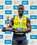 30 July 2023; Israel Olatunde of UCD AC, Dublin, with the Paddy Larkin Memorial Trophy after winning the men's 100m during day two of the 123.ie National Senior Outdoor Championships at Morton Stadium in Dublin. Photo by Sam Barnes/Sportsfile