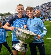 30 July 2023; Paul Mannion of Dublin, with Oisin Deehan, and the Sam Maguire Cup after the GAA Football All-Ireland Senior Championship final match between Dublin and Kerry at Croke Park in Dublin. Photo by Ramsey Cardy/Sportsfile