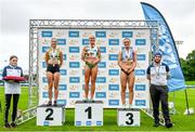 30 July 2023; Women's 100m medallists, Sarah Lavin of Emerald AC, Limerick, gold, centre, Lucy-May Sleeman of Leevale AC, Cork, silver, left, and Mollie O'Reilly of Dundrum South Dublin AC, bronze, right, with Athletics Ireland Chair of Competitions Andrew Lynam, far right, during day two of the 123.ie National Senior Outdoor Championships at Morton Stadium in Dublin. Photo by Sam Barnes/Sportsfile