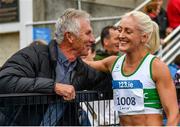 30 July 2023; Women's 100m and 100m hurdles gold medallist Sarah Lavin of Emerald AC, Limerick is congratuled by Olympian Eamonn Coghlan during day two of the 123.ie National Senior Outdoor Championships at Morton Stadium in Dublin. Photo by Sam Barnes/Sportsfile