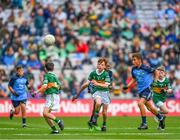 30 July 2023; Zachary Murphy McKeon, Scoil an Spioraid Naoimh, Cork, representing Kerry, in action against Joseph Tarmey, Lismore NS, Waterford, representing Dublin, during the INTO Cumann na mBunscol GAA Respect Exhibition Go Games at the GAA Football All-Ireland Senior Championship final match between Dublin and Kerry at Croke Park in Dublin. Photo by Ray McManus/Sportsfile