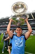 30 July 2023; Lorcan O'Dell of Dublin lifts the Sam Maguire Cup after the GAA Football All-Ireland Senior Championship final match between Dublin and Kerry at Croke Park in Dublin. Photo by Ramsey Cardy/Sportsfile