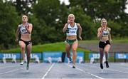 30 July 2023; Sarah Lavin of Emerald AC, Limerick, centre, on her way to winning the women's 100m, ahead of Lucy-May Sleeman of Leevale AC, Cork, right, who finished second, and Mollie O'Reilly of Dundrum South Dublin AC, left, who finished third, during day two of the 123.ie National Senior Outdoor Championships at Morton Stadium in Dublin. Photo by Sam Barnes/Sportsfile