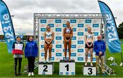 30 July 2023; Women's 400m medallists, Sharlene Mawdsley of Newport AC, Tipperary, gold, centre, Sophie Becker of Raheny Shamrock AC, Dublin, silver, left, and Roisin Harrison of Emerald AC, Limerick, bronze, right, with 123.ie managing director Elaine Robinson, second from left, and RSA Insurance Ireland Chief Executive Officer Kevin Thompson during day two of the 123.ie National Senior Outdoor Championships at Morton Stadium in Dublin. Photo by Sam Barnes/Sportsfile