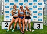 30 July 2023; Women's 400m medallists, Sharlene Mawdsley of Newport AC, Tipperary, gold, centre, Sophie Becker of Raheny Shamrock AC, Dublin, silver, left, and Roisin Harrison of Emerald AC, Limerick, bronze, right, during day two of the 123.ie National Senior Outdoor Championships at Morton Stadium in Dublin. Photo by Sam Barnes/Sportsfile