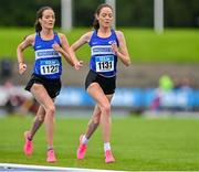 30 July 2023; Eilish, left, and Roisin Flanagan of Finn Valley AC, Donegal, competes in the women's 5000m and during day two of the 123.ie National Senior Outdoor Championships at Morton Stadium in Dublin. Photo by Stephen Marken/Sportsfile