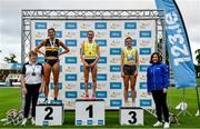 30 July 2023; Women's 1500m medallists, Sarah Healy of UCD AC, Dublin, gold, centre, Sophie O'Sullivan of Ballymore Cobh AC, Cork, silver, left, and Ellie Hartnett of UCD AC, Dublin, bronze, right, with Athletic's Ireland Competition Committee Member Patricia Griffin, far left, and 123.ie managing director Elaine Robinson, far right, during day two of the 123.ie National Senior Outdoor Championships at Morton Stadium in Dublin. Photo by Sam Barnes/Sportsfile