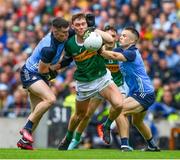 30 July 2023; Gavin White of Kerry is tackled by Lee Gannon and Eoin Murchan of Dublin during the GAA Football All-Ireland Senior Championship final match between Dublin and Kerry at Croke Park in Dublin. Photo by Ray McManus/Sportsfile