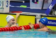 31 July 2023; Roisin Ryan of Irleand, left, with Carlotta Gilli of Italy after the Women’s 100m Butterfly S13 during day one of the World Para Swimming Championships 2023 at Manchester Aquatics Centre in Manchester. Photo by Paul Greenwood/Sportsfile