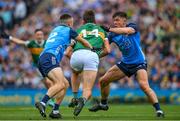 30 July 2023; David Clifford of Kerry is tackled by David Byrne and Eoin Murchan of Dublin, left, during the GAA Football All-Ireland Senior Championship final match between Dublin and Kerry at Croke Park in Dublin. Photo by Ray McManus/Sportsfile