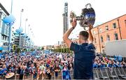 31 July 2023; Brian Fenton of Dublin with the Sam Maguire cup during the homecoming celebrations of the Dublin All-Ireland Football Champions at Smithfield Square in Dublin. Photo by Ramsey Cardy/Sportsfile