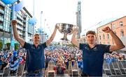 31 July 2023; Paul Mannion, left, and Michael Fitzsimons of Dublin with the Sam Maguire cup during the homecoming celebrations of the Dublin All-Ireland Football Champions at Smithfield Square in Dublin. Photo by Ramsey Cardy/Sportsfile