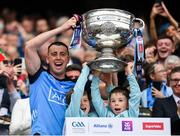 30 July 2023; Cormac Costello of Dublin lifts the Sam Maguire Cup after the GAA Football All-Ireland Senior Championship final match between Dublin and Kerry at Croke Park in Dublin. Photo by Seb Daly/Sportsfile