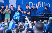 31 July 2023; Lee Gannon, right, and teammates during the homecoming celebrations of the Dublin All-Ireland Football Champions at Smithfield Square in Dublin. Photo by Ramsey Cardy/Sportsfile