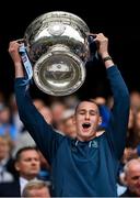 30 July 2023; Peadar Ó Cofaigh Byrne of Dublin lifts the Sam Maguire Cup after the GAA Football All-Ireland Senior Championship final match between Dublin and Kerry at Croke Park in Dublin. Photo by Seb Daly/Sportsfile
