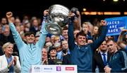 30 July 2023; Dublin players Ben Millist, left, and Liam Smith lift the Sam Maguire Cup after the GAA Football All-Ireland Senior Championship final match between Dublin and Kerry at Croke Park in Dublin. Photo by Seb Daly/Sportsfile