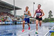 30 July 2023; Brian Fay of Raheny Shamrock AC, Dublin, left, and Cormac Dalton of Mullingar Harriers AC, Westmeath, compete in the men's 5000m during day two of the 123.ie National Senior Outdoor Championships at Morton Stadium in Dublin. Photo by Sam Barnes/Sportsfile