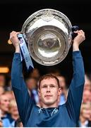 30 July 2023; Senan Forker of Dublin lifts the Sam Maguire Cup after the GAA Football All-Ireland Senior Championship final match between Dublin and Kerry at Croke Park in Dublin. Photo by Ramsey Cardy/Sportsfile