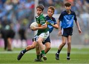 30 July 2023; Shea Henry, Holy Family PS, Magherafelt, Derry, representing Kerry, and Joseph Tarmey, Lismore NS, Waterford, representing Dublin, during the INTO Cumann na mBunscol GAA Respect Exhibition Go Games at the GAA Football All-Ireland Senior Championship final match between Dublin and Kerry at Croke Park in Dublin. Photo by Seb Daly/Sportsfile